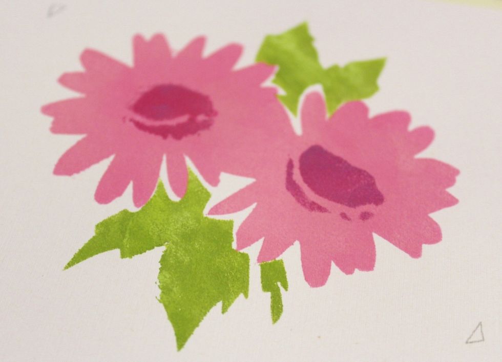 tape on leaves stencil, matching registration marks. then ink leaves using a clean tip with the Stylus and heat set...