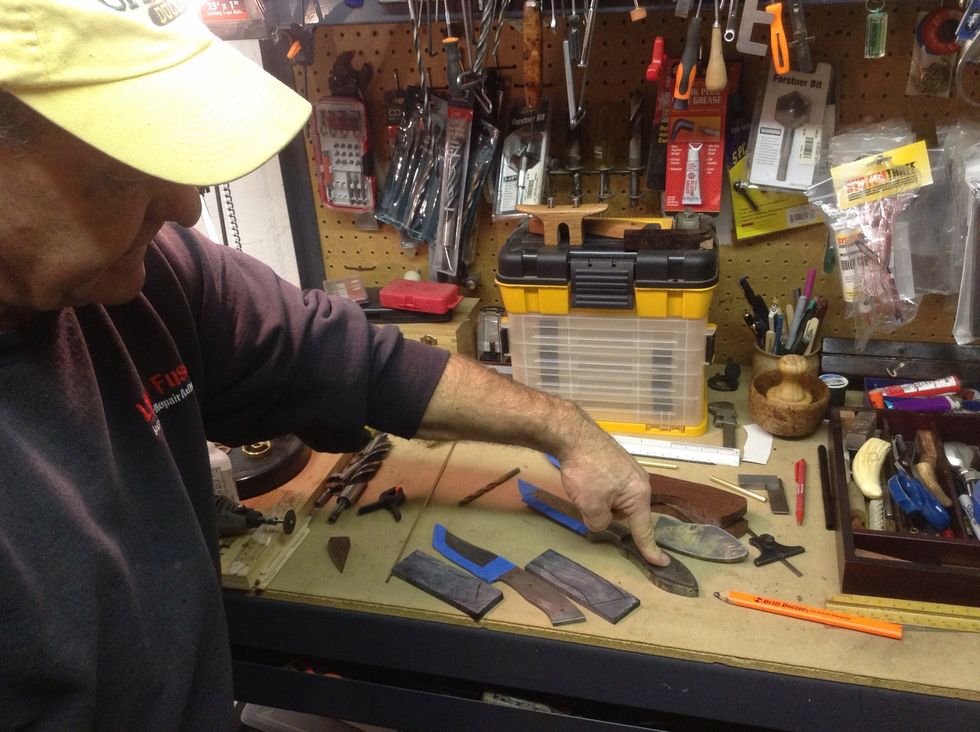 Tape one side of the handle to the blank, and get ready to drill.