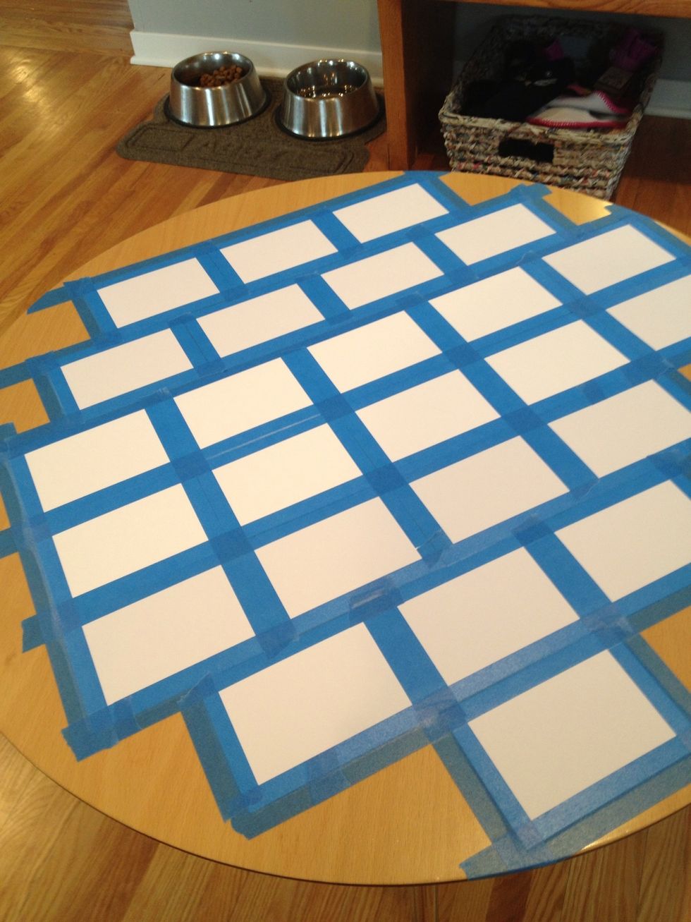 Tape out cards to fill out the table.