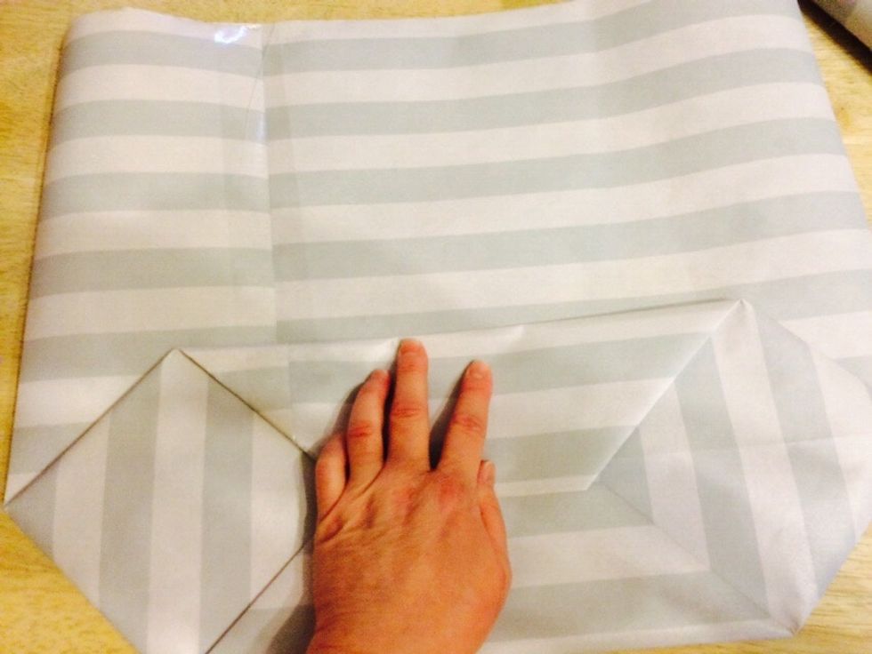 Tape, staple or glue down.