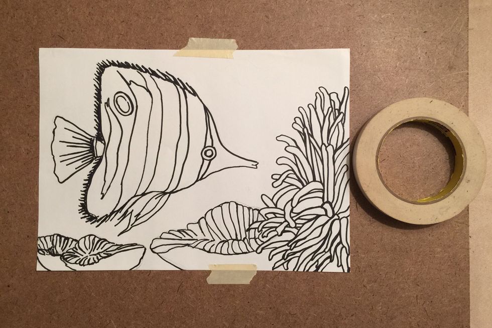 Tape the drawing down to a wood or masonite board.