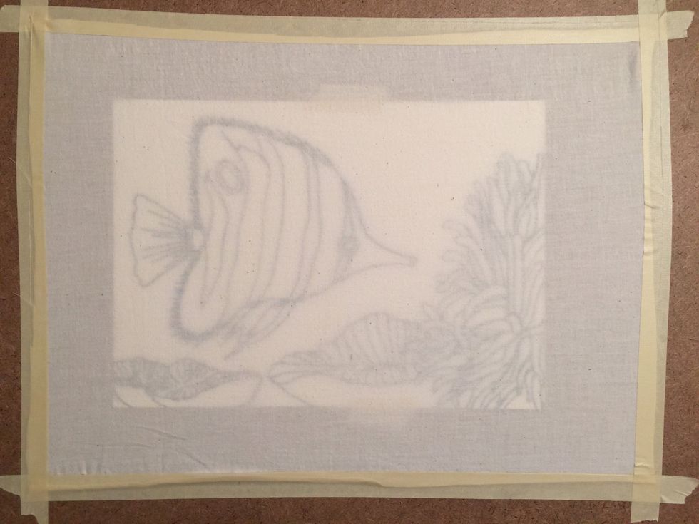 Tape the muslin over the drawing, pulling the fabric tightly as you tape it down.