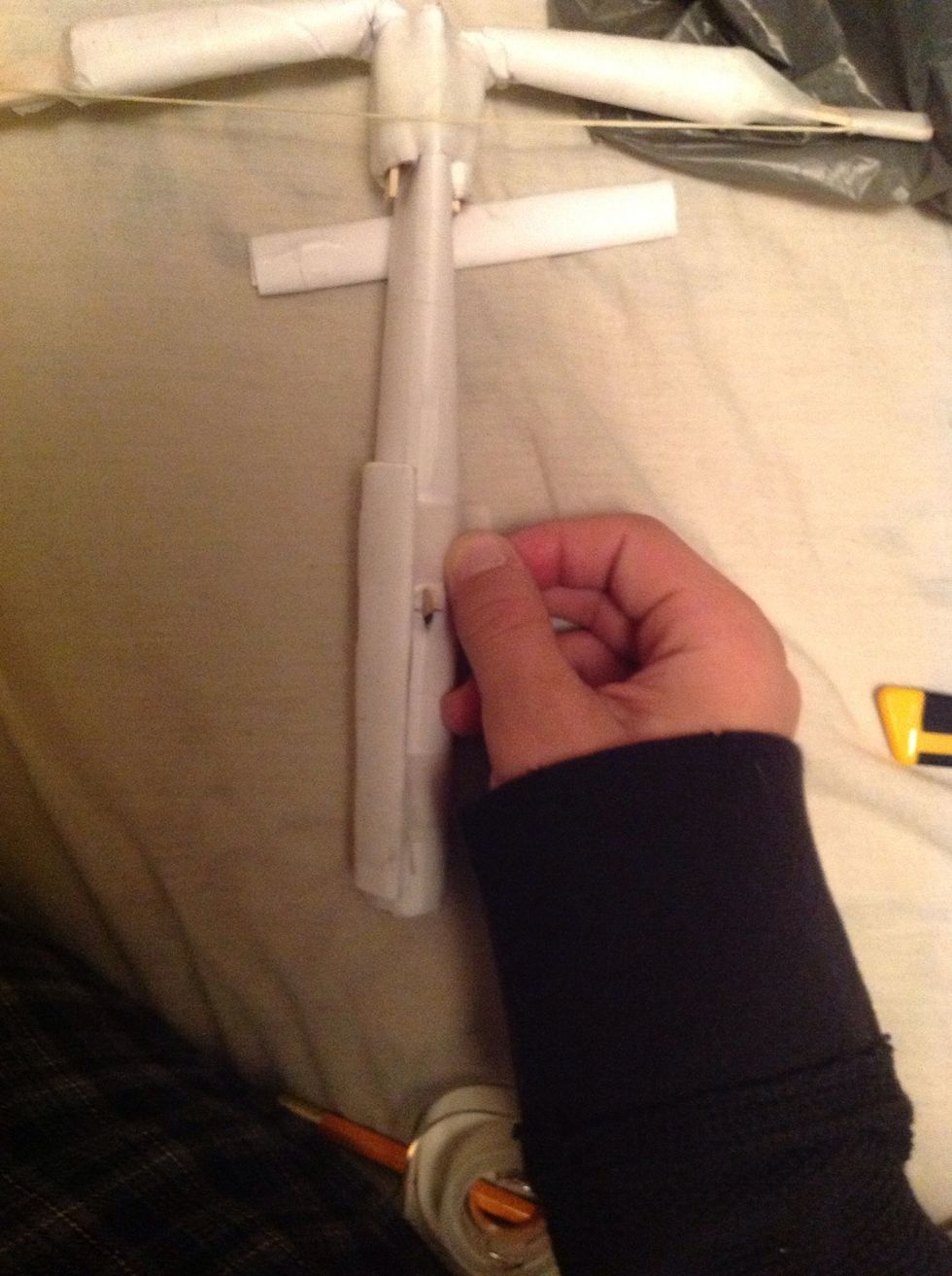 Tape the one on along side your trigger.
