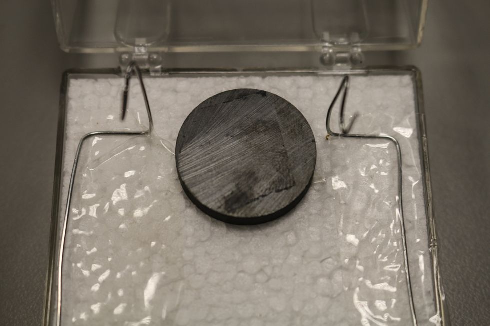 Tape the other hook wire on the opposite side. Notice how they are lined up.