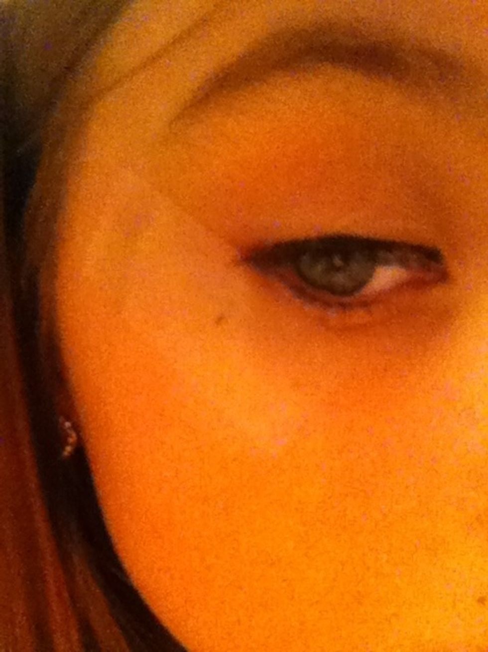 Tape the outer corner of your eye