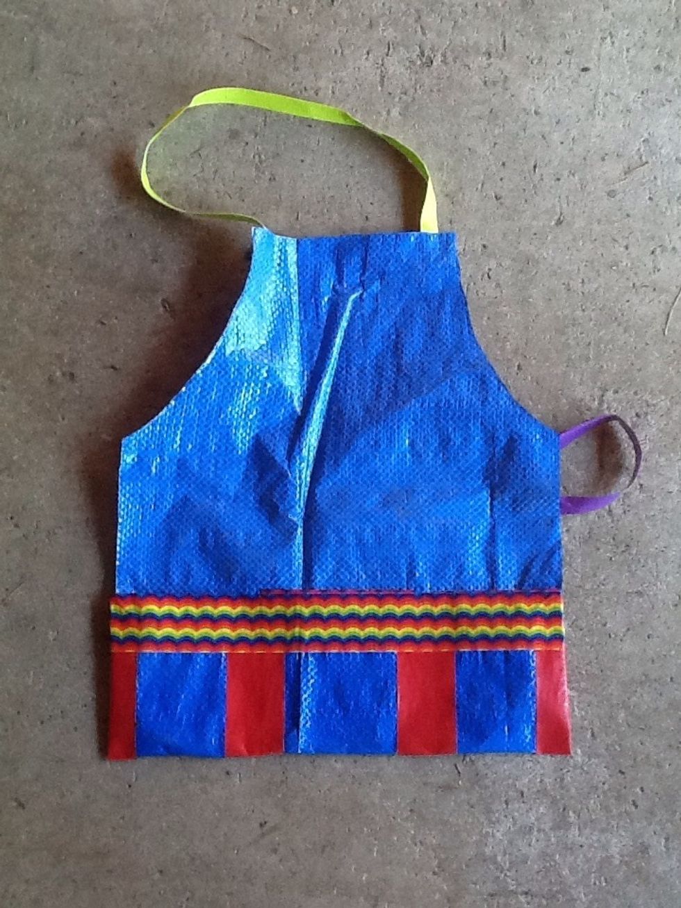 Tape the pockets down to tarp.