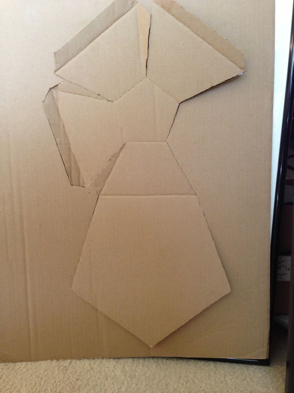 Tape the template to the cardboard and Trace over the template with your X-Acto knife not pushing through the entire template. Remove the templateCut through the cardboard on the edges.