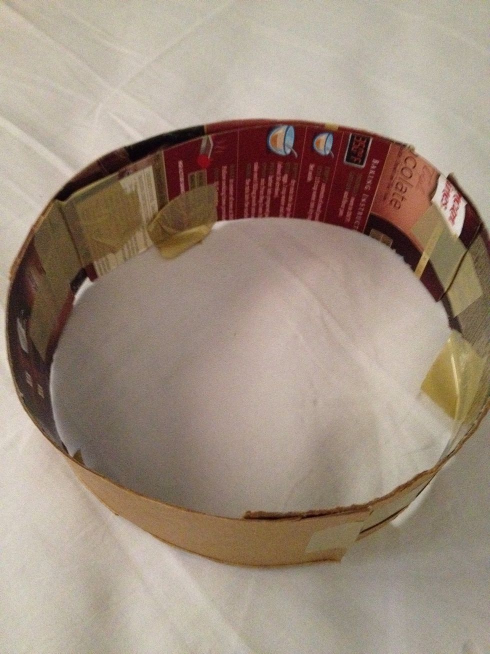 Tape them to form a circle. Make sure it is strong