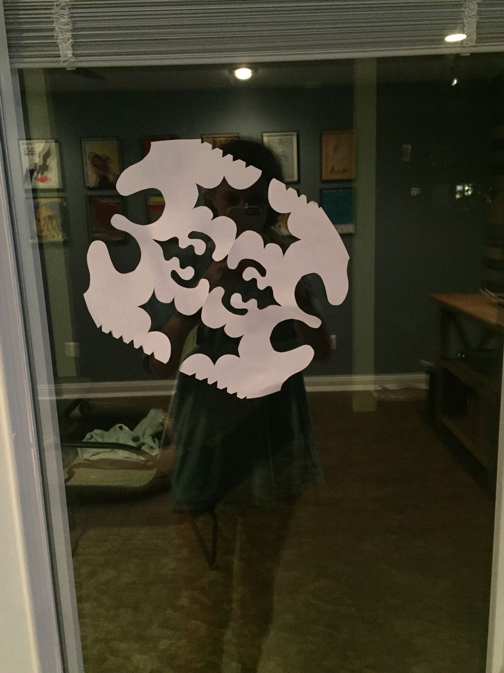 Tape to window of your choice.