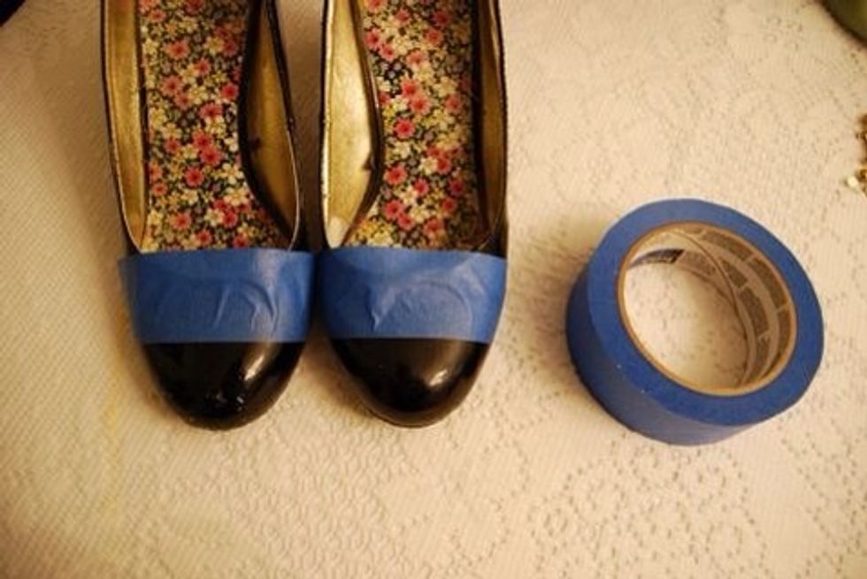 Tape up where you want glitter to be! Make sure your clean your shows first. The tape will stick better and you will get a crisper line.