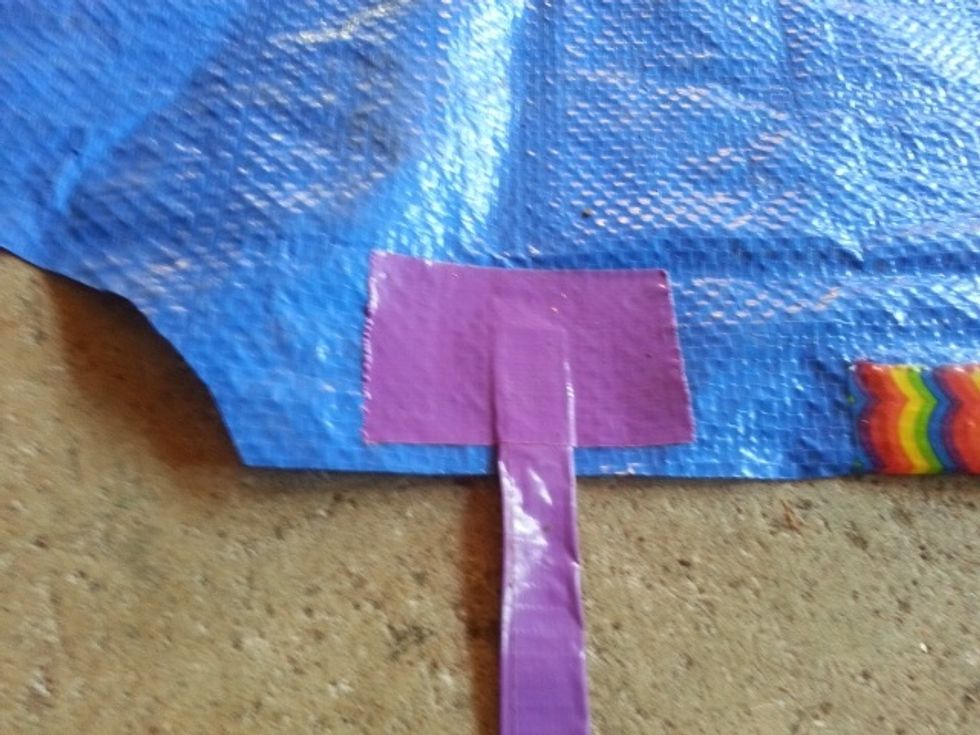 Tape waist strap to back side of apron