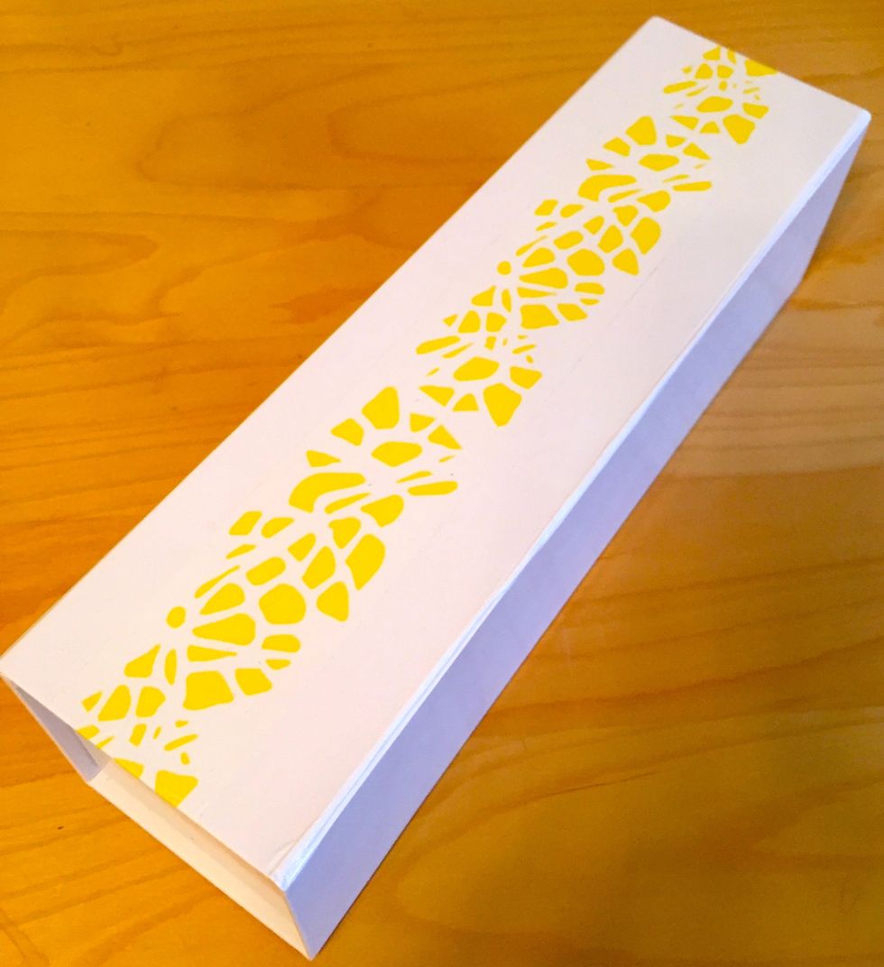 Tape your box. I am using a wine box that I bought at the Container Store. I taped the box just on the top instead of across the magnetic close. This way, you can use the box again.