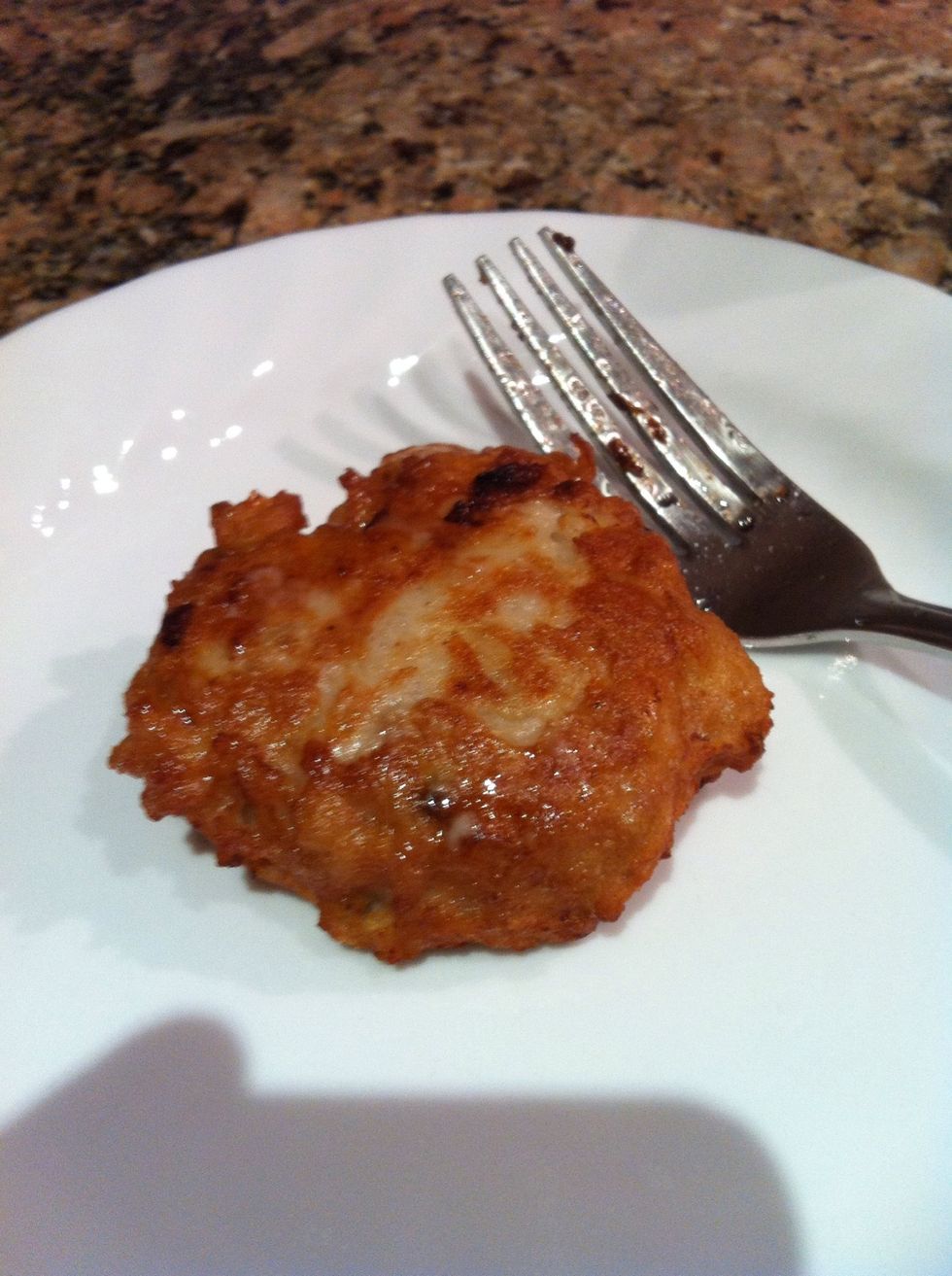Taste one.  The onion should be soft and the chicken and grated potato fully cooked.  This is also the time to make adjustments to the remaining meat mixture. Add S&P if necessary or add other spices.