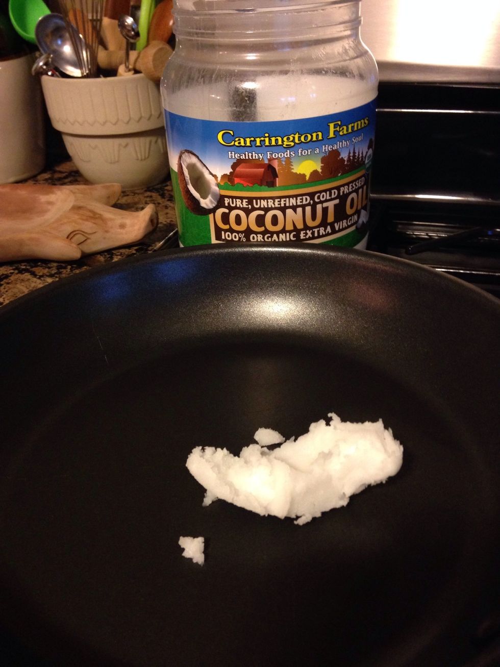 Tblsp Organic Coconut Oil in sauce pan over medium heat.