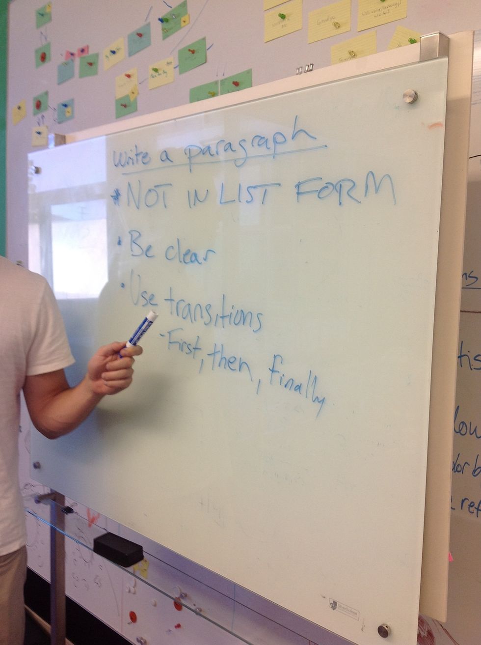 Teacher asks pairs of students to write a single, collaborative paragraph. The students will explain what level they played, what tools they used, and what they did.