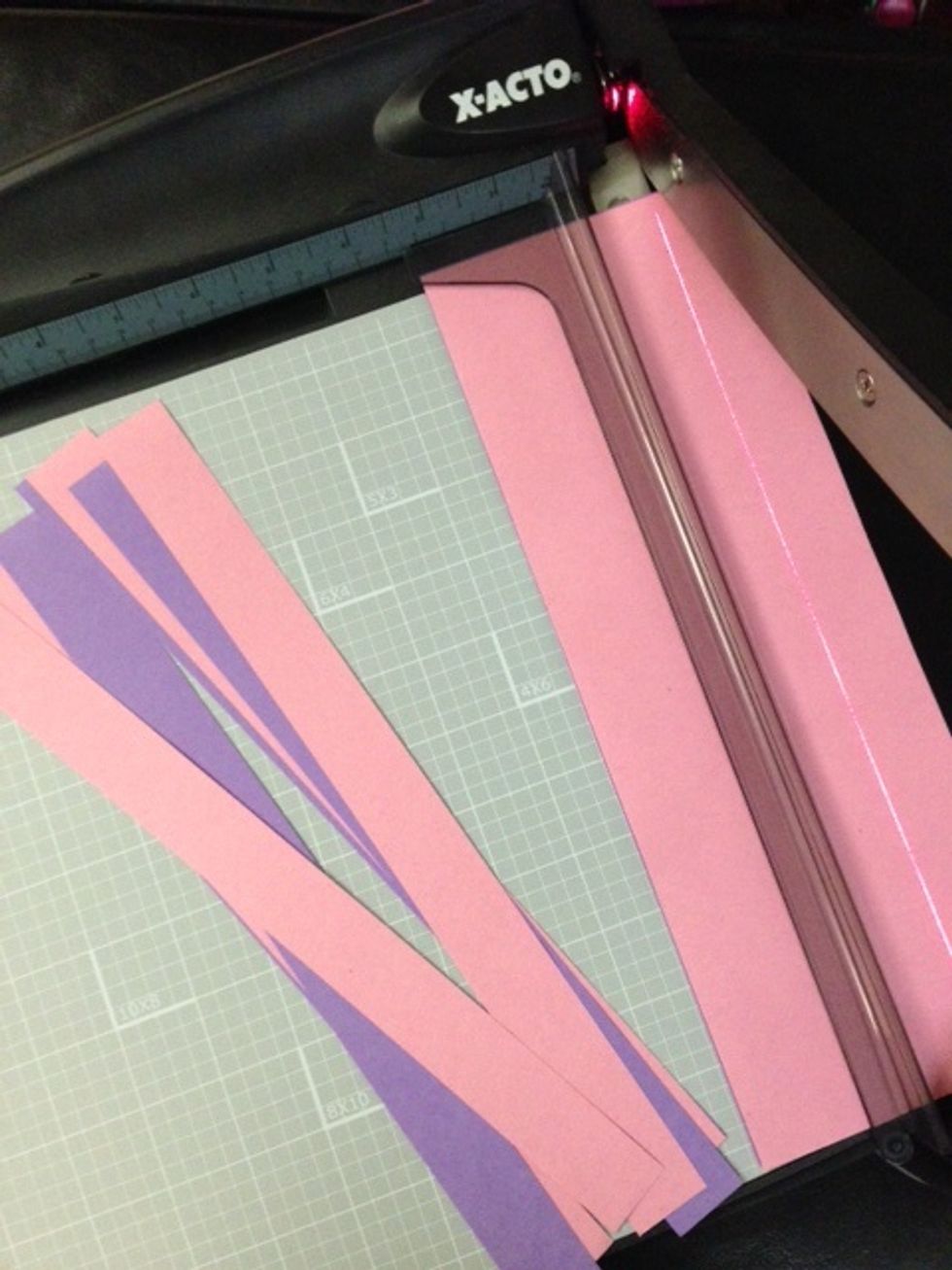 Teacher will pre-cut 1 inch construction paper strips of various colors.