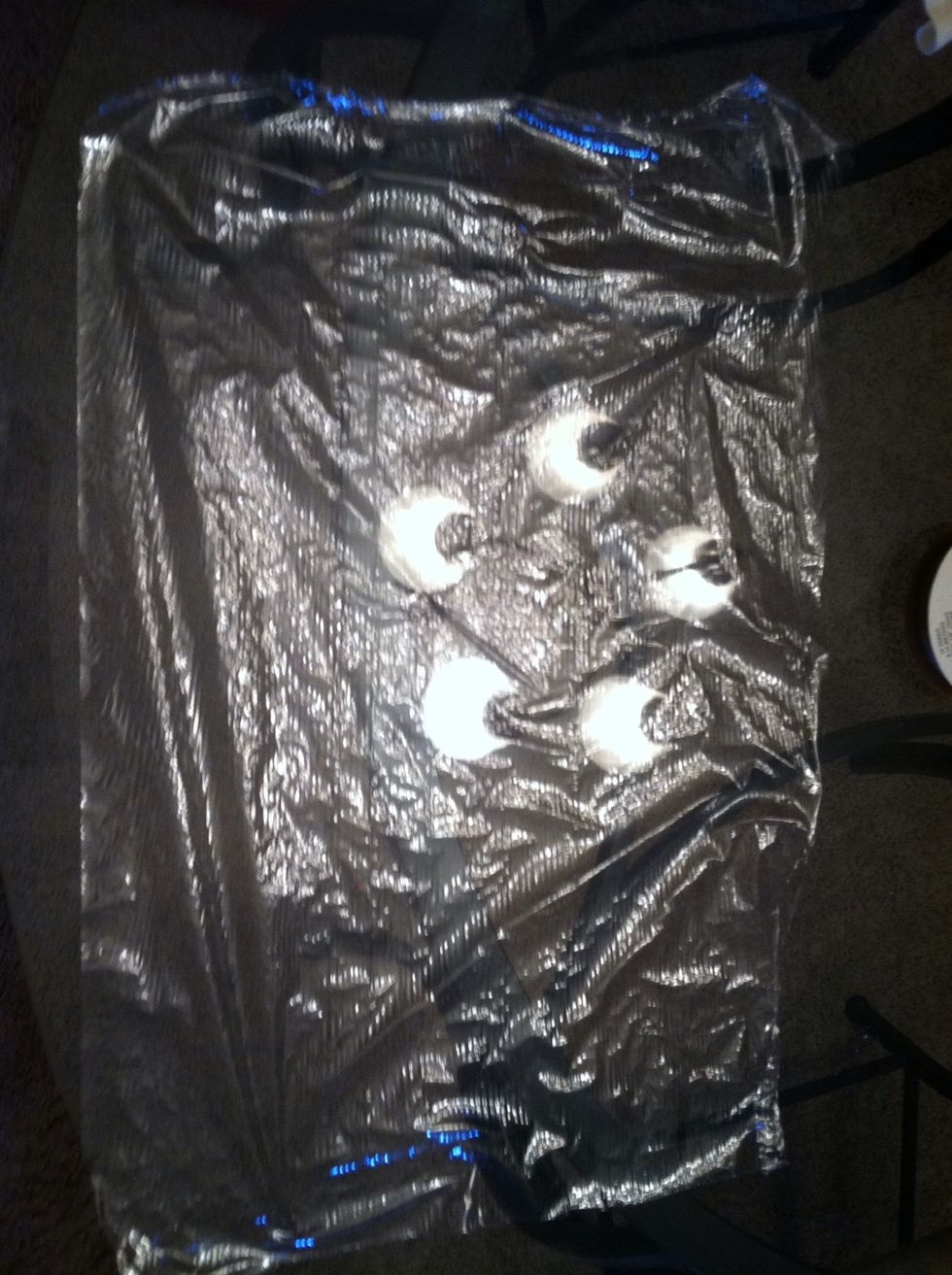 Tear a piece of plastic wrap about 15" off and spread it out.