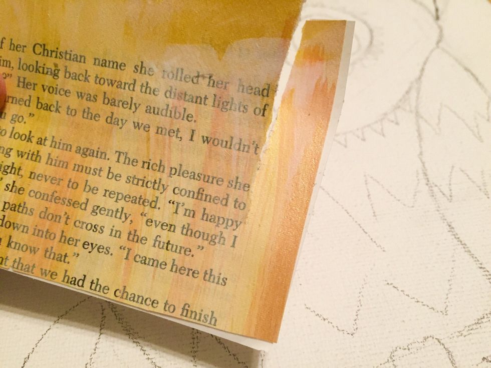 tear adhesive backed paper into strips, then tear strips into small pieces.