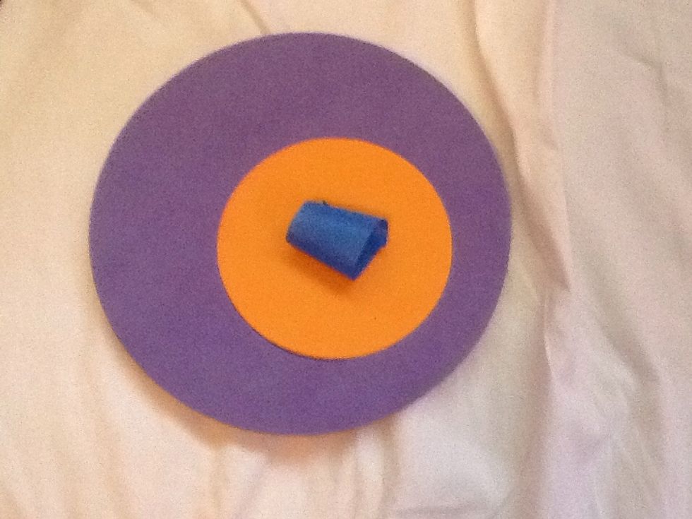 Tear off a piece and tape it on the board