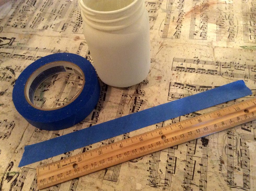 Tear off a piece of tape approx. 12" long. (I used pint jars, if using a different size you will need to adjust a few of the steps, i.e.; your tape may need to be a bit longer if your jars are wider.)