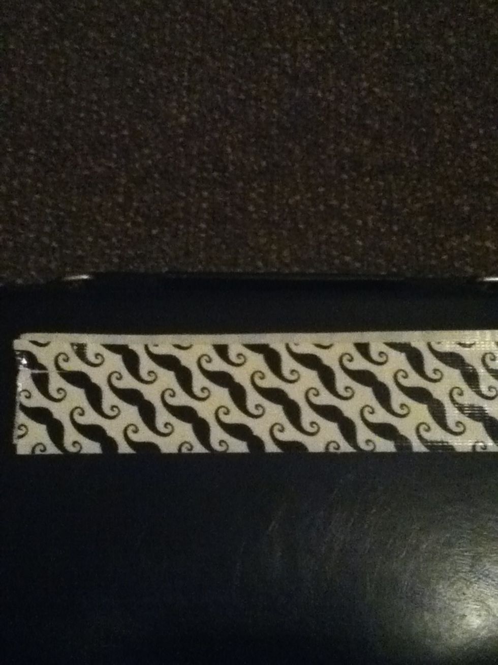 Tear off a second strip and place it on top of the first one. Sticky side to sticky side