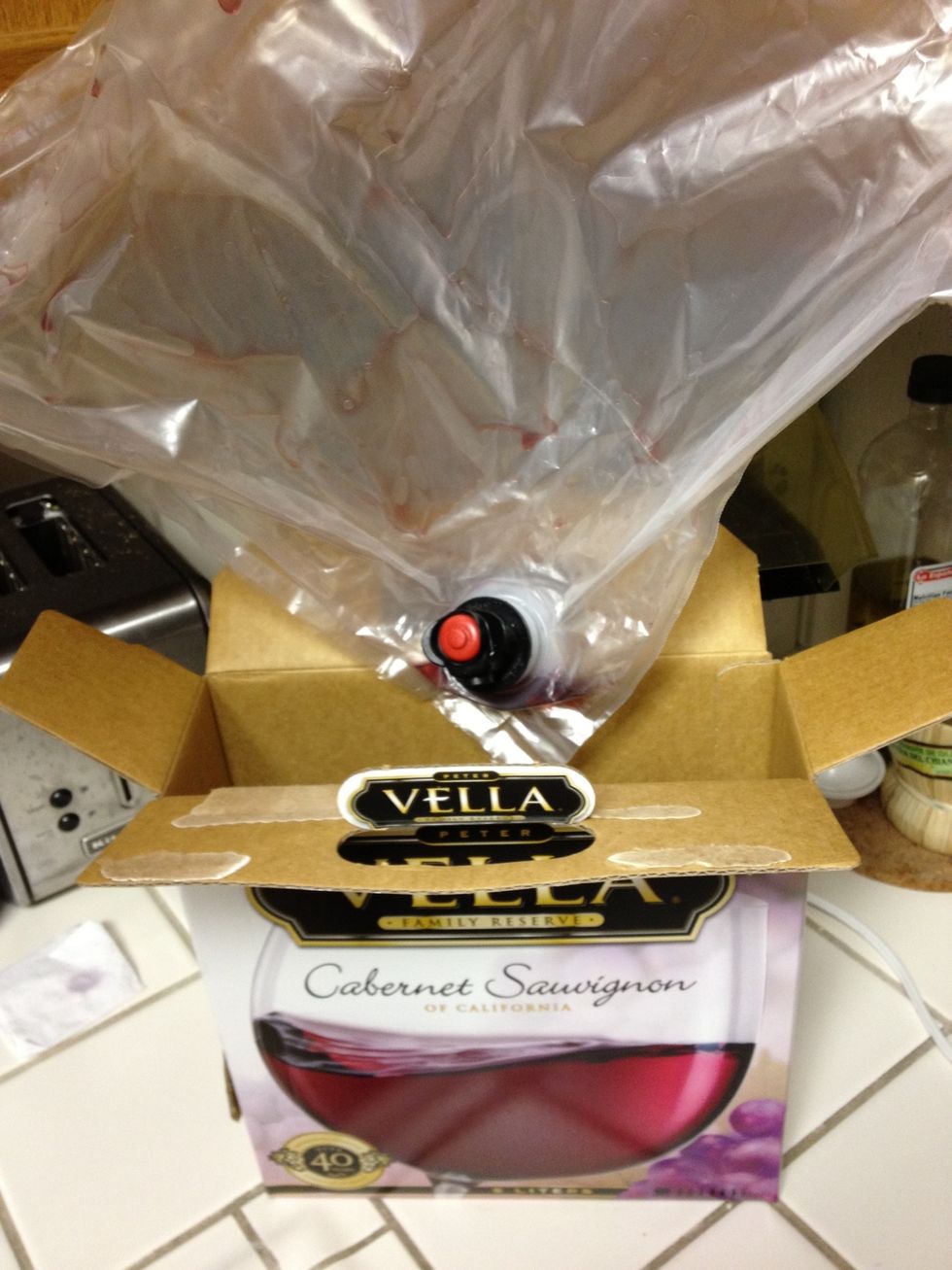 Tear open that cardboard and remove the wine bag. Remember to recycle the cardboard - we're saving the world one drink at a time!