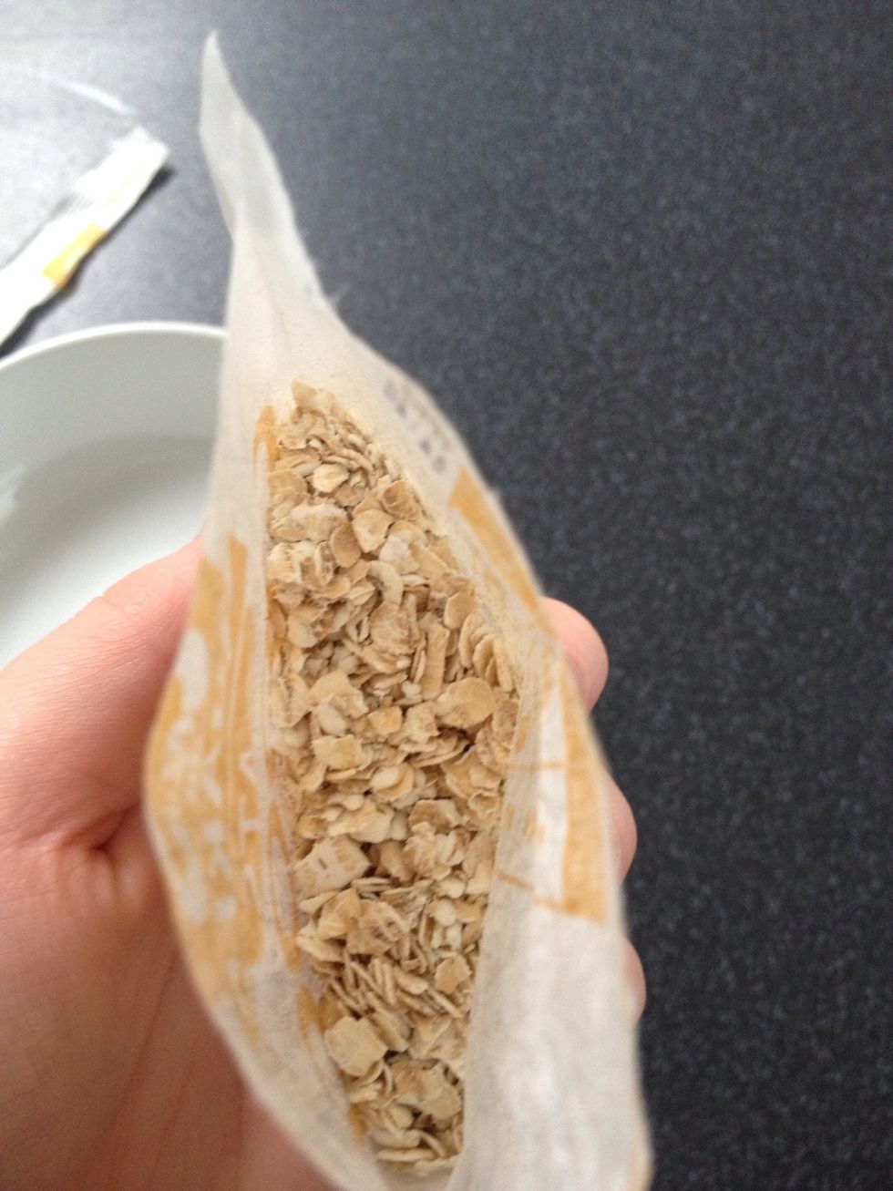 Tear open your sachet so as you can pop it into this shape to then add your milk with the oats still inside. You will see there is a fill line on the back, roughly 180ml.