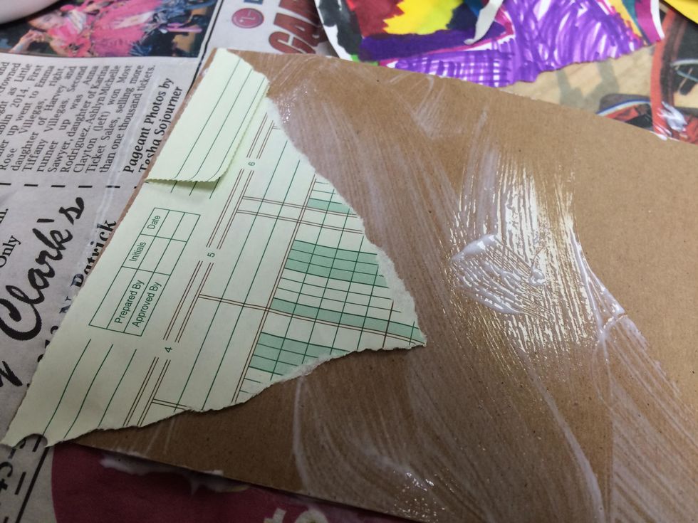 Tear or cut peices of scrap paper and apply to wet Mod-Podge.