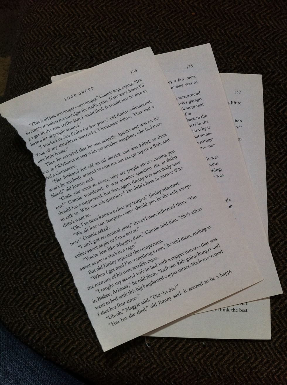 Tear out three pages from a book.