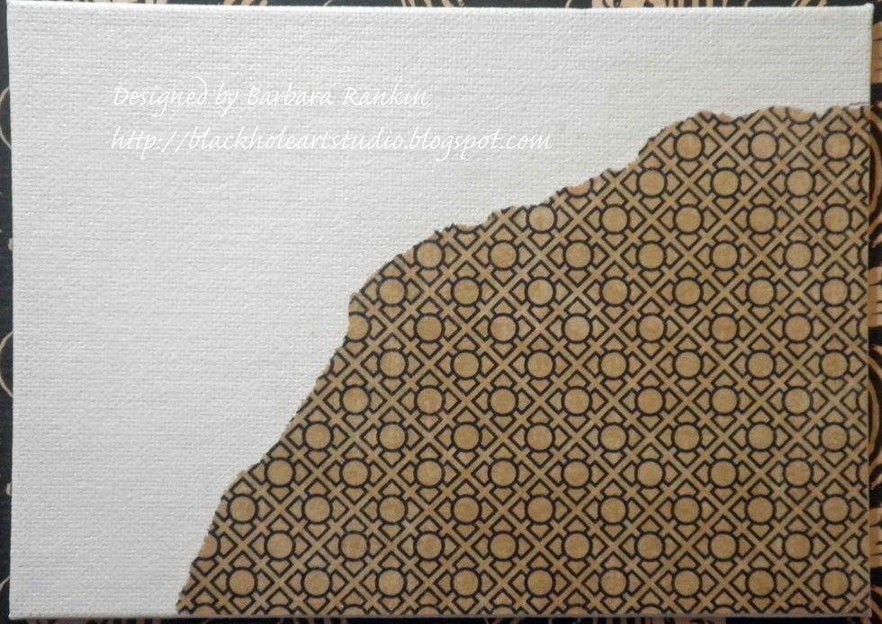 Tear strip of Graphic 45 paper to fit corner of 5x7 canvas. Adhere with matte medium.