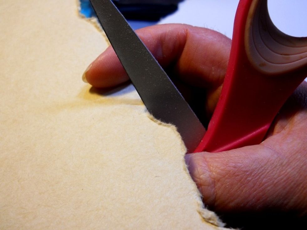 tear the edges and distress the edges of a piece of smooth white cardstock until the piece is approx. 11"x11".