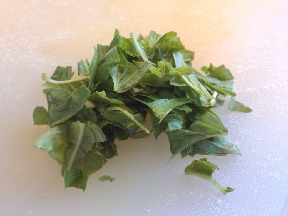 Tear up the basil leaves and add to the sauce just before serving. Taste the sauce and season with salt and pepper, and chili flakes if desired.