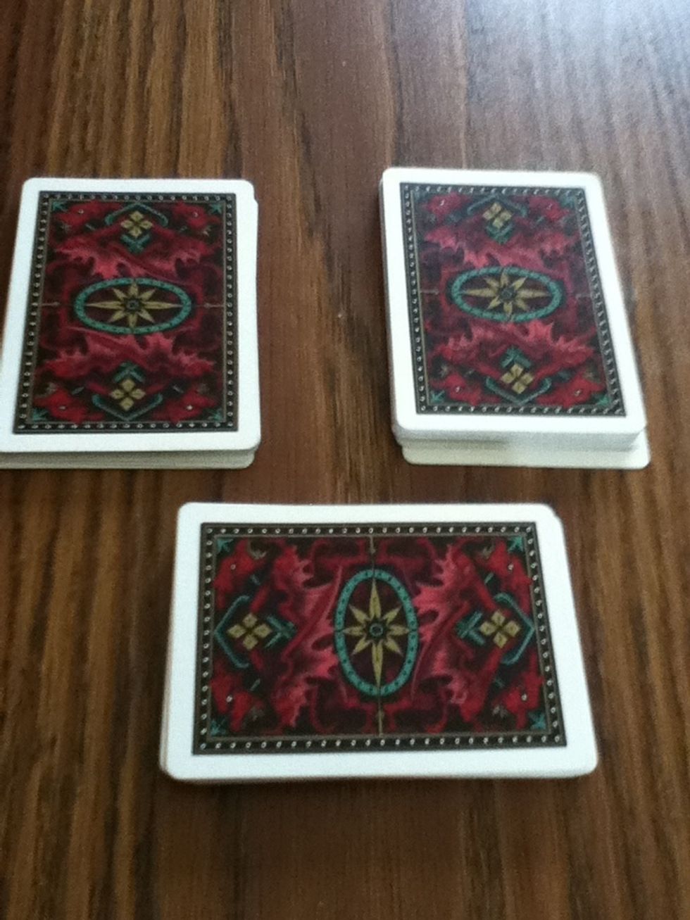 Tell the to guess what each card is (red or black) and separate each color into different piles. Black on one side, red on the other when you are about half way done STOP.