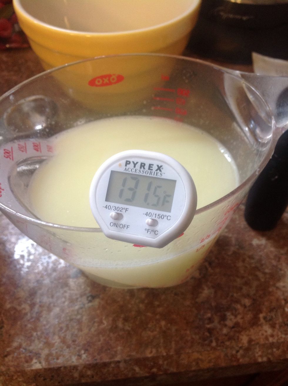 Temp is almost there but not yet. If you put the water in when its too hot it will KILL the yeast which makes it rise ... You don't want flat bread.
