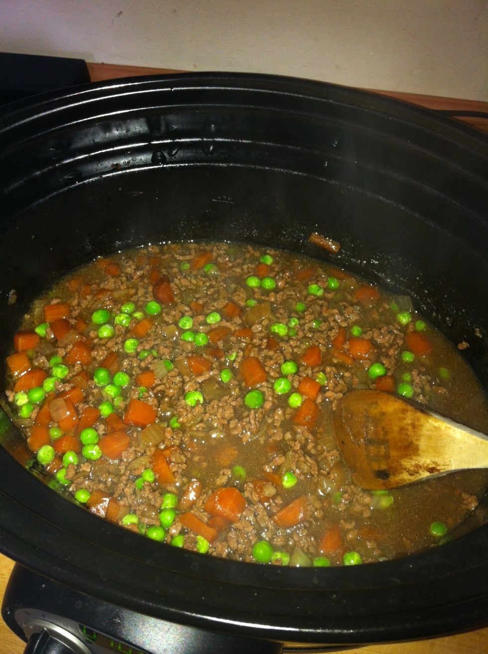 Ten minutes before serving add the frozen peas & stir.