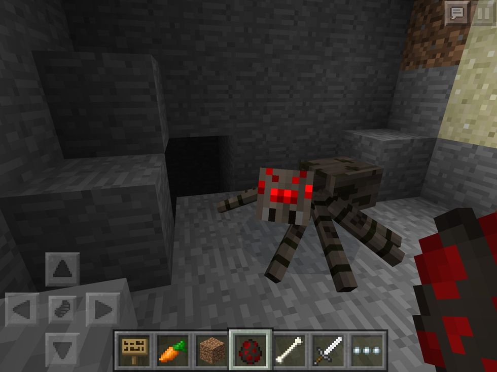 Terrifying! This is a Spider and can climb up blocks very quickly. You can tell a spider is nearby when you hear them make screechy noises!