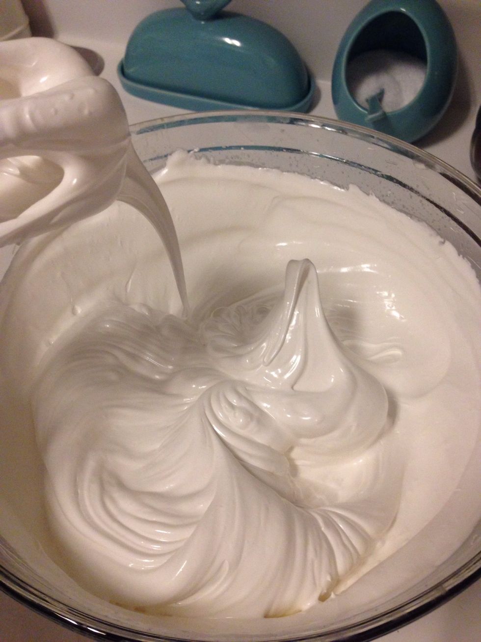 Test frosting by stopping beaters and removing them from the bowl - if the frosting stands up, it's done! Scoop frosting into piping bag (I like a round tip) or a ziplock bag with the corner cut off