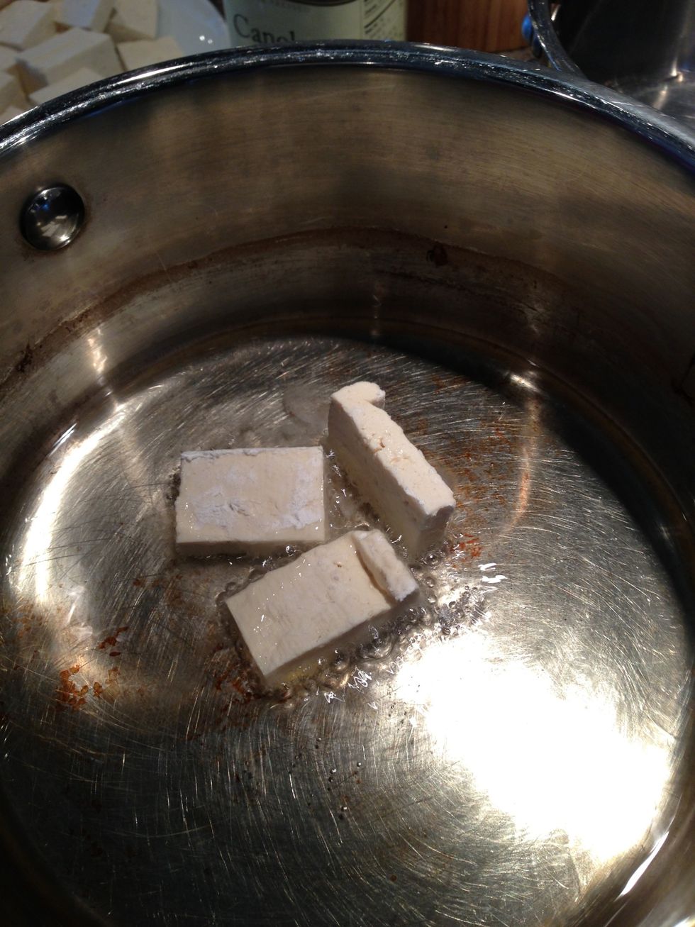 Test the oil with a piece of tofu. When it sizzles put the others in.