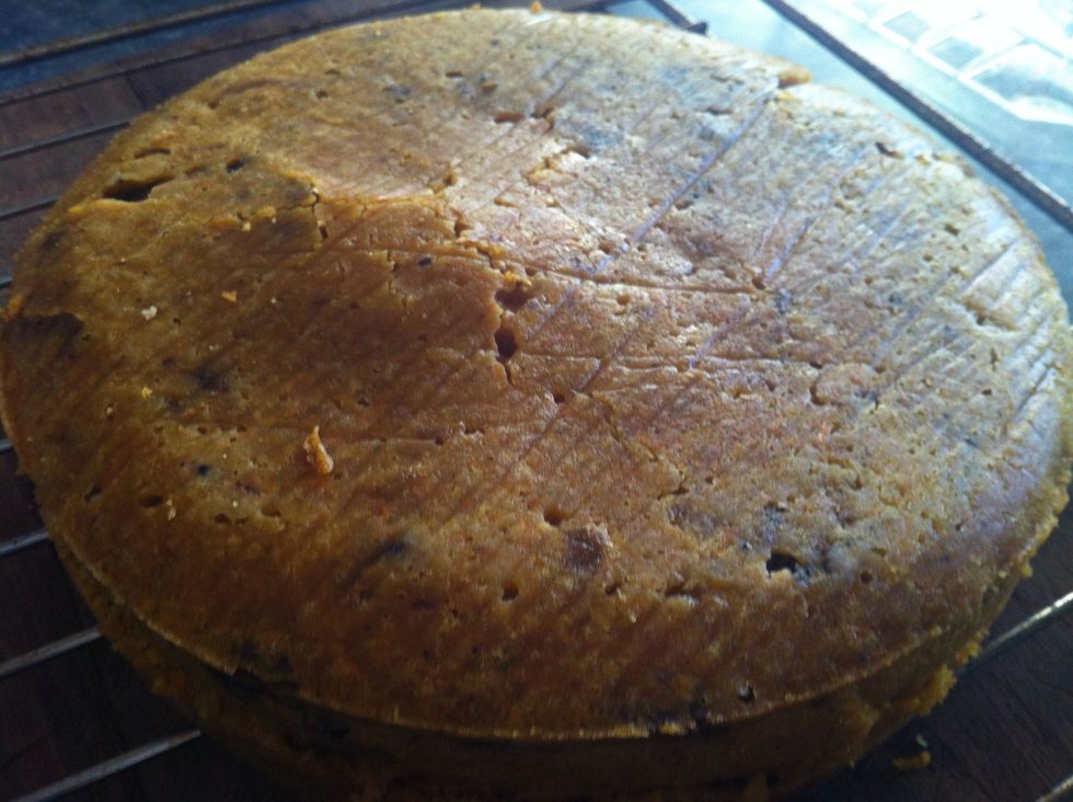 Test with skewer to see if the cake is done. Remove from oven. Allow to cool on a rack. Slice the cake in half to get 2 discs, if you wish to ice the cake.