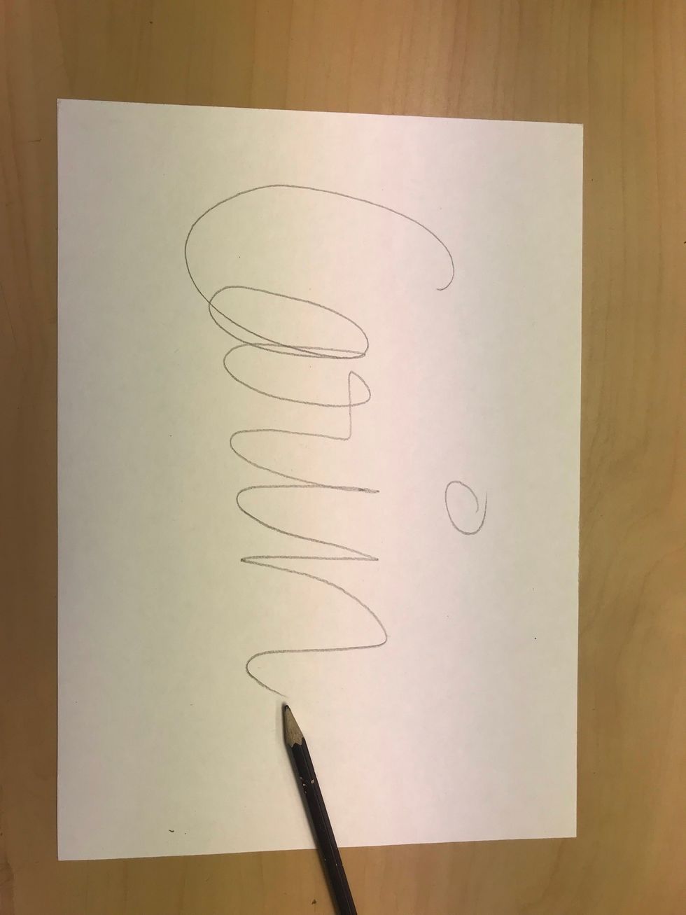 Texta ditt namn med en blyertspenna.