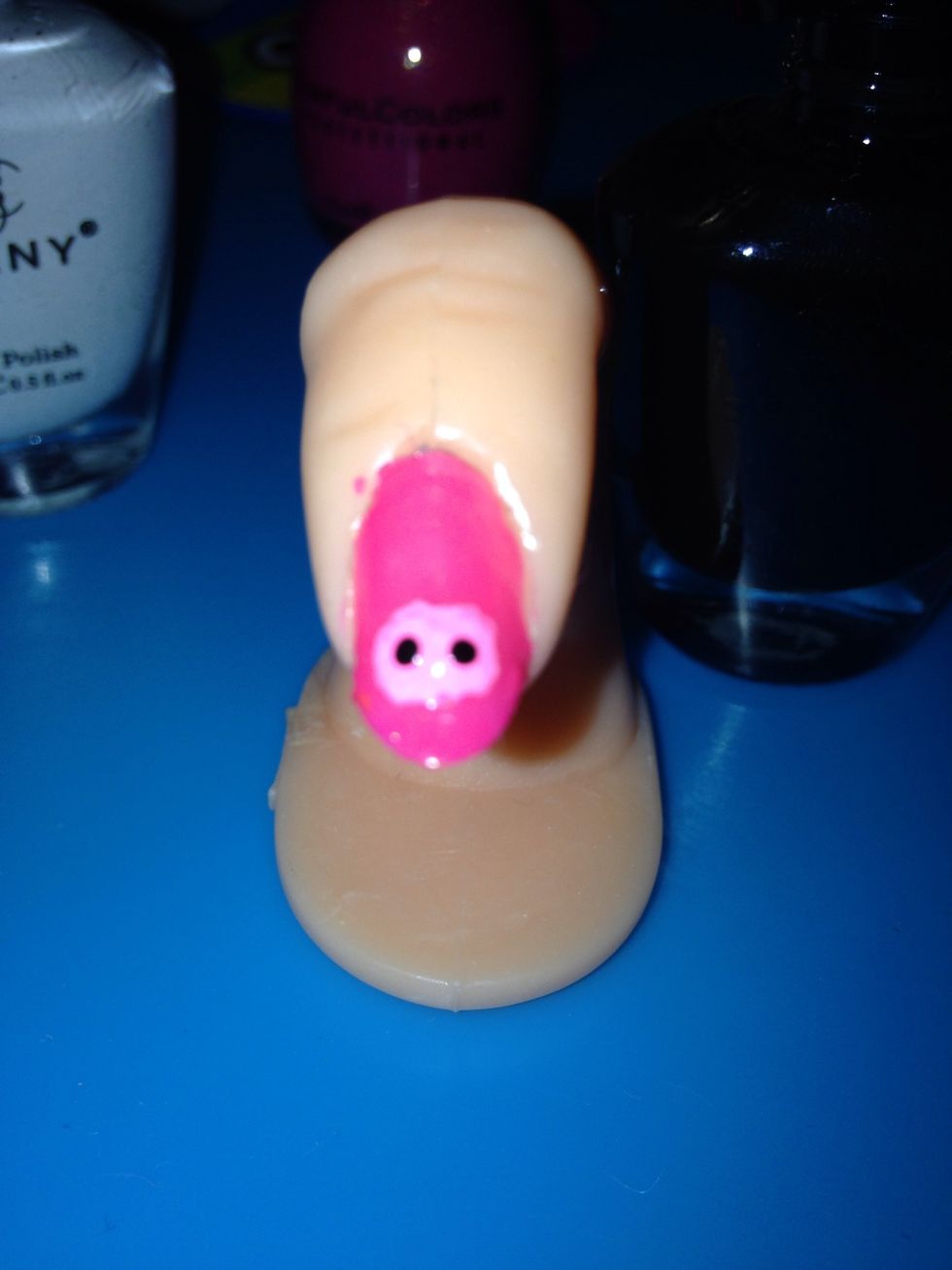 Than add the nostrils or the two black dots