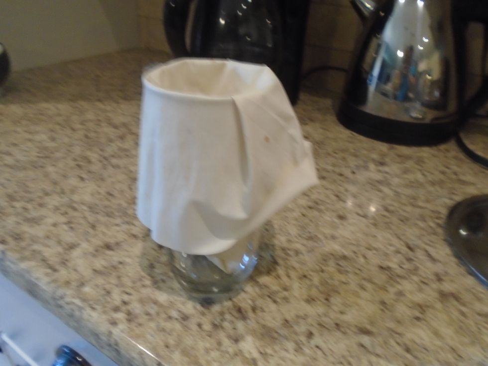Than fold down the sides over the rim of the glass as needed.