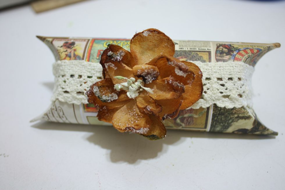 That enables you to close the party favor box back up. I finished this one off with sugared blooms in mocha