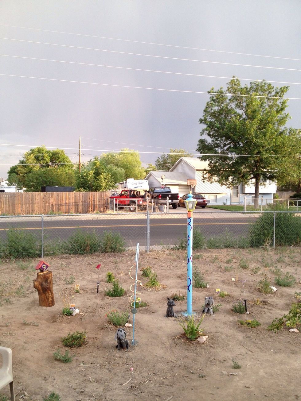 That got me going. Next I painted the light poll and a plant hook. I started adding solar light.