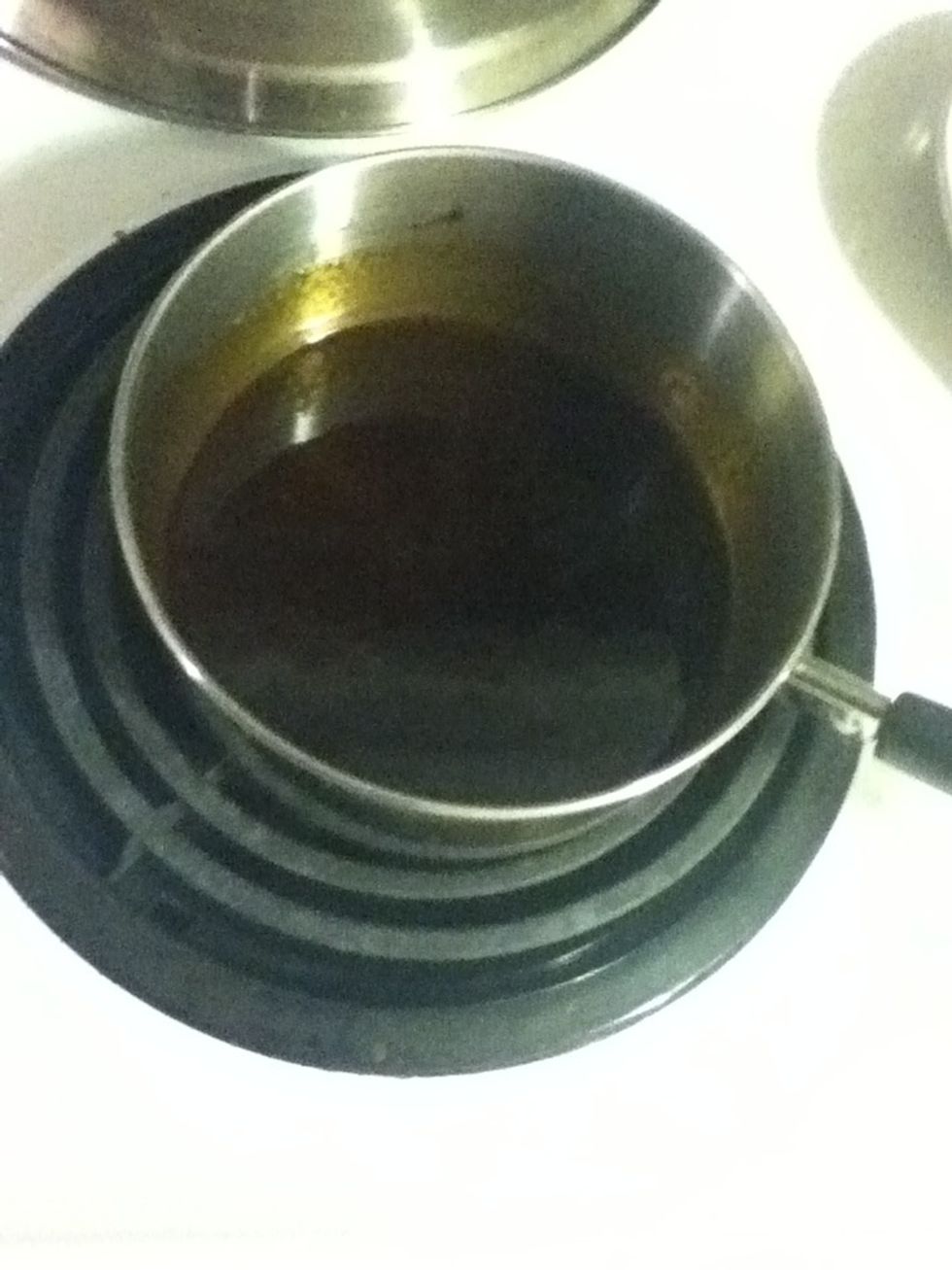 That palm sugar is rock hard, so you gotta simmer it with the liquids until it dissolves. Then tip in those shrimp you soaked and that's your pad Thai sauce. Easy peasy.