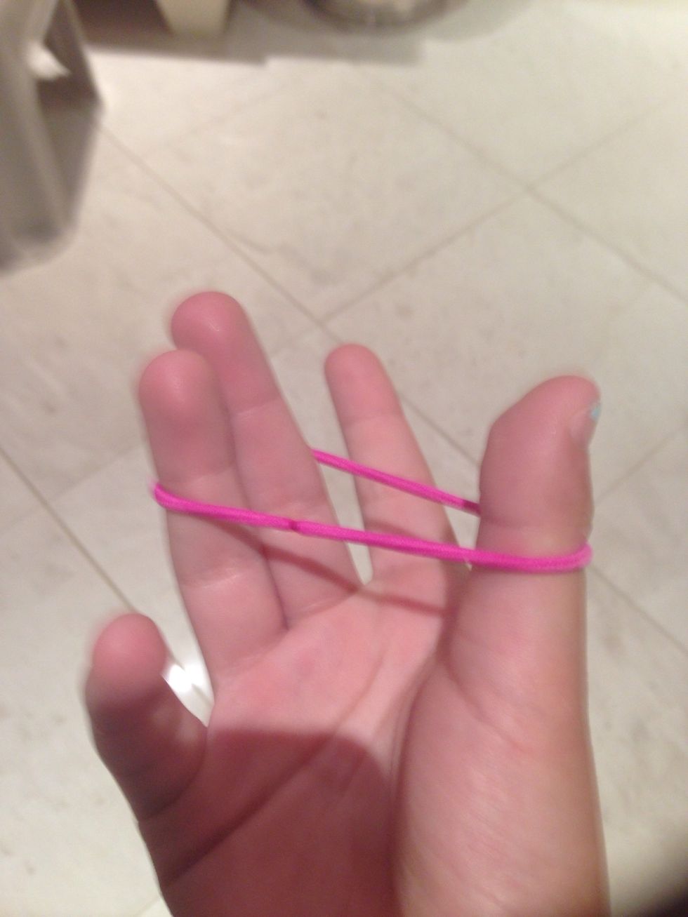 How to make a knot with a elastic/rubber band with 1 hand B+C Guides