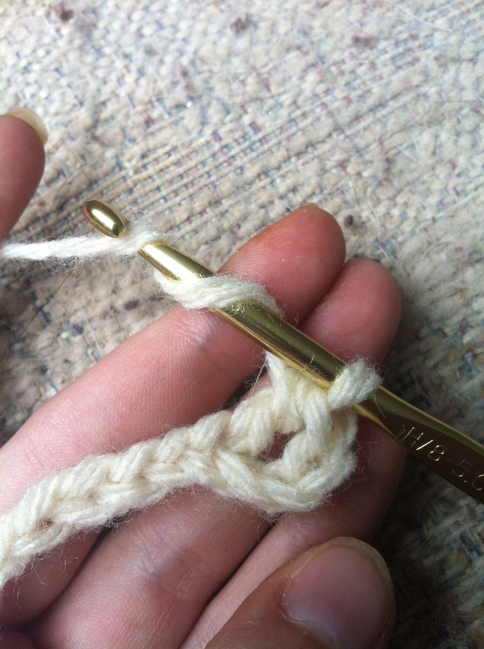 that's your first half treble crochet!! yippie :) for the next one: yarn around twice and insert your hook in the next chain.