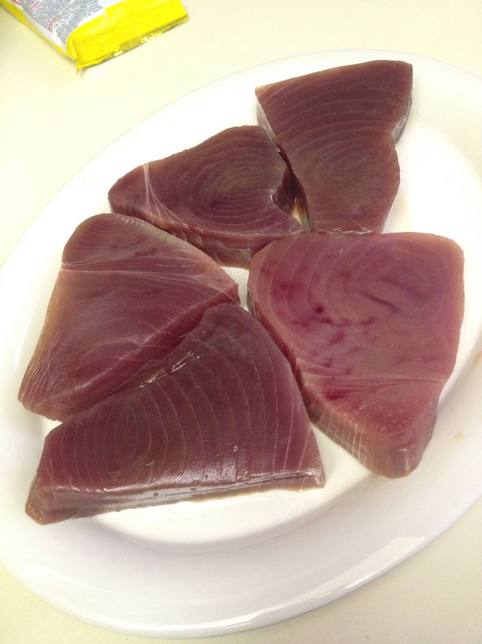 Thaw 4 or 5 pieces of fish. I prefer tuna steaks or swordfish.