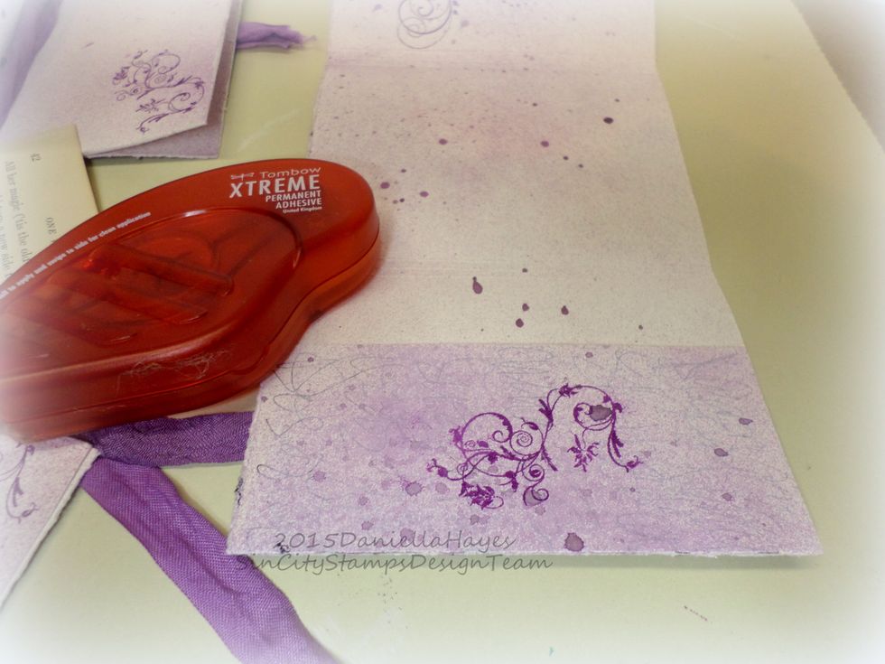 The 2" score line is for a pocket. Just fold the pocket to the inside of the cover and adhere the sides to the cover. Now you have a place to put little things you want to add to your journal.