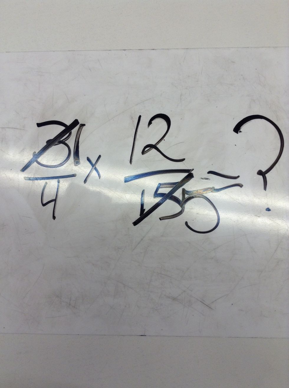 The 3 and 15 can both be reduced by 3. We did 3 divided by 3 and that equaled to 1. Then we did 15 divided by 3 and that equaled 5.